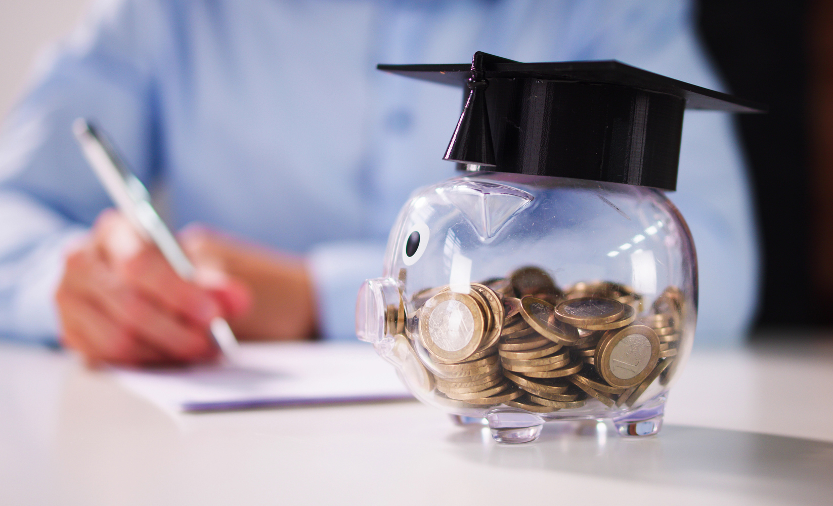 Piggy Bank With School Education Budget. Graduate Loan